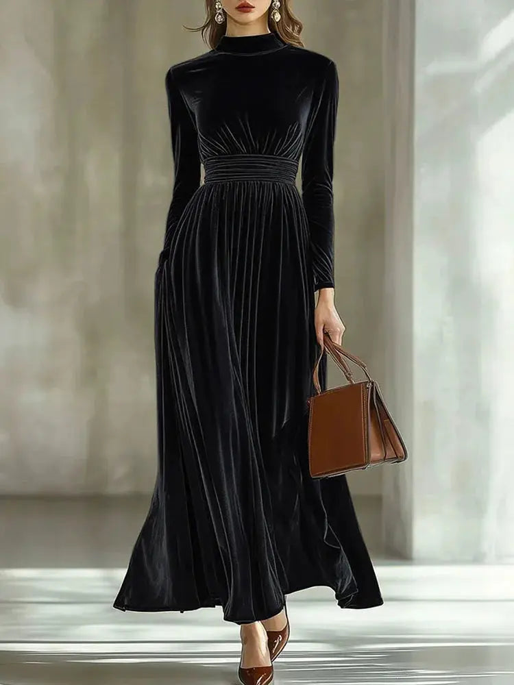 Pleated design of the Velvet Whisper Dress, enhancing its elegant look.