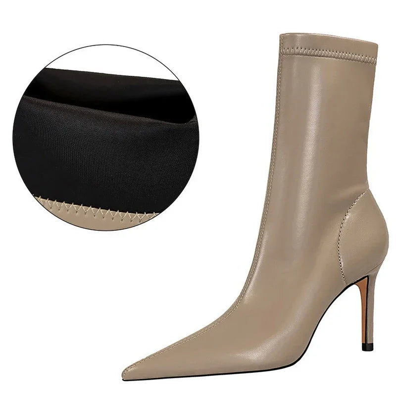 Premium leather mid-calf boots perfect for tailored and casual outfits
