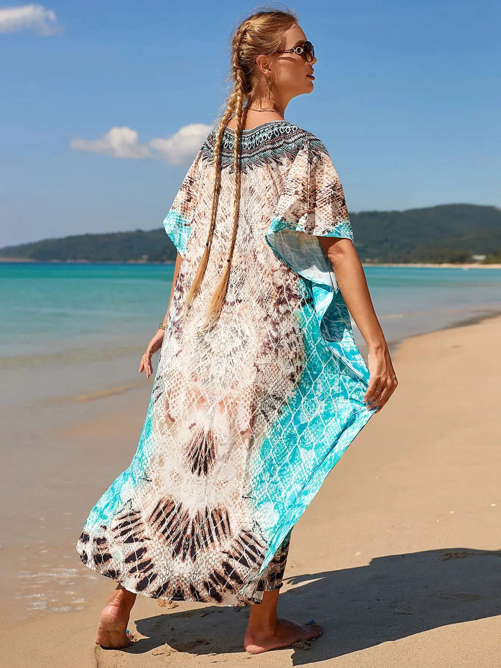 Close-up of the V-neck detail on the Breeze Whisper Kaftan, highlighting its elegant and chic style.