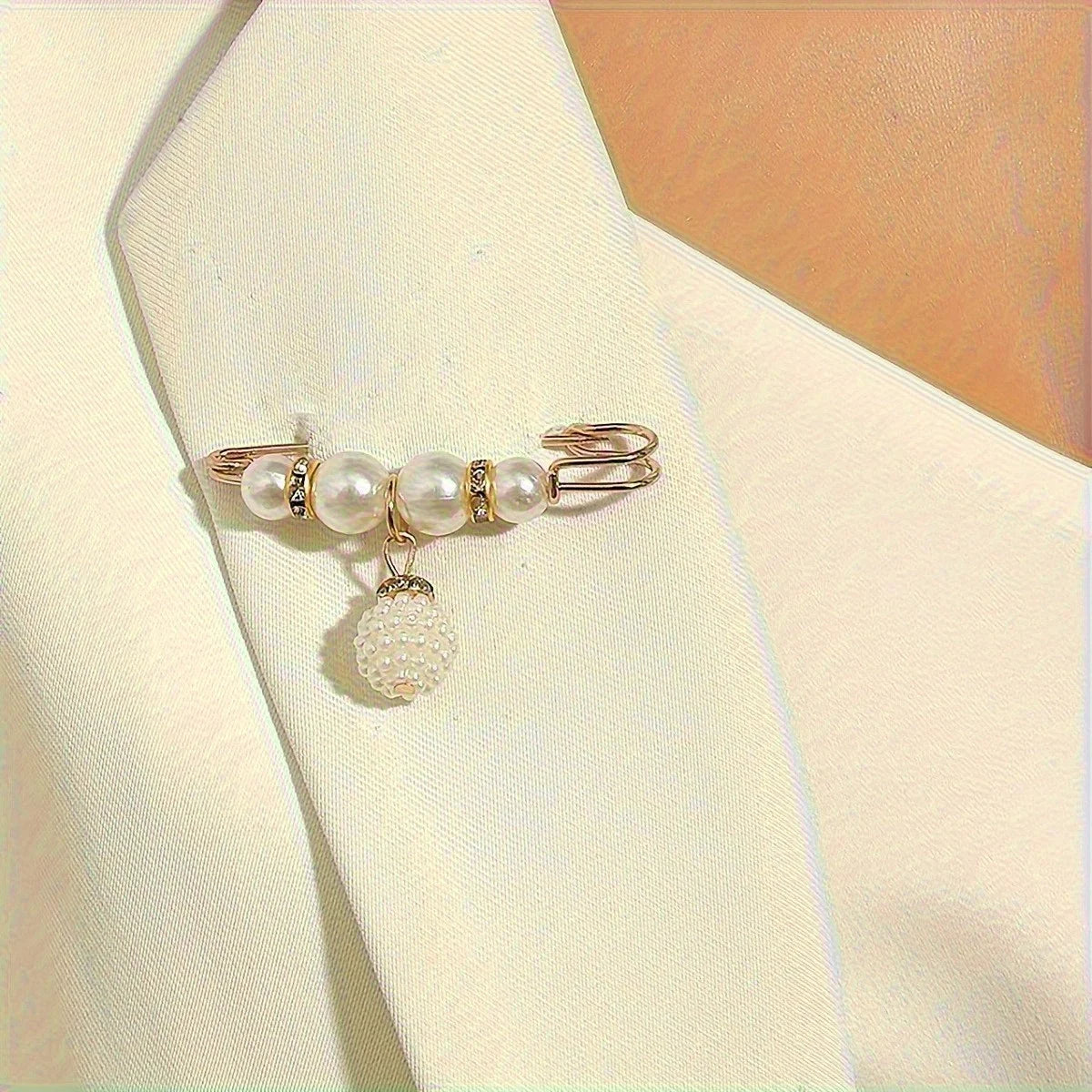 Lightweight decorative brooches featuring shimmering surfaces for style.