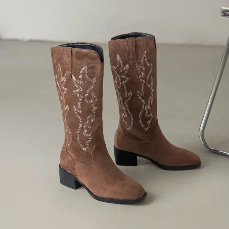 Knee-high cowboy boots with premium leather and decorative stitching