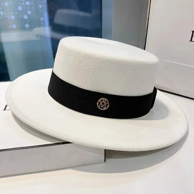Transform your presence with this chic fedora, a must-have accessory for any wardrobe.