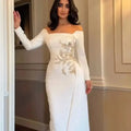 Elegant off-shoulder satin gown in rich color with delicate beading and sweep train.