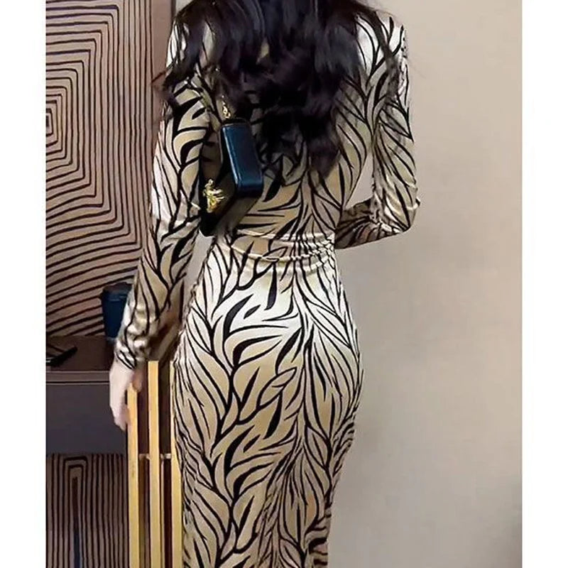 Elegant champagne toned leopard print dress with V-neckline for day to evening wear