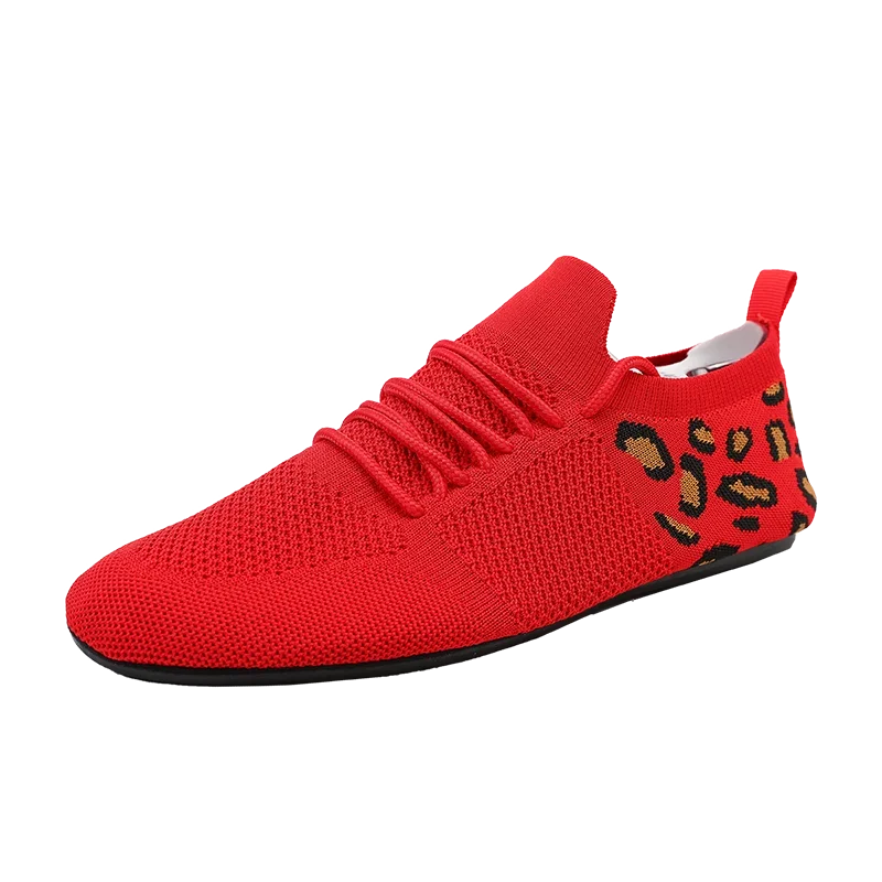 Dynamic mesh sneakers on a city sidewalk, illustrating their lightweight nature and stylish appeal.