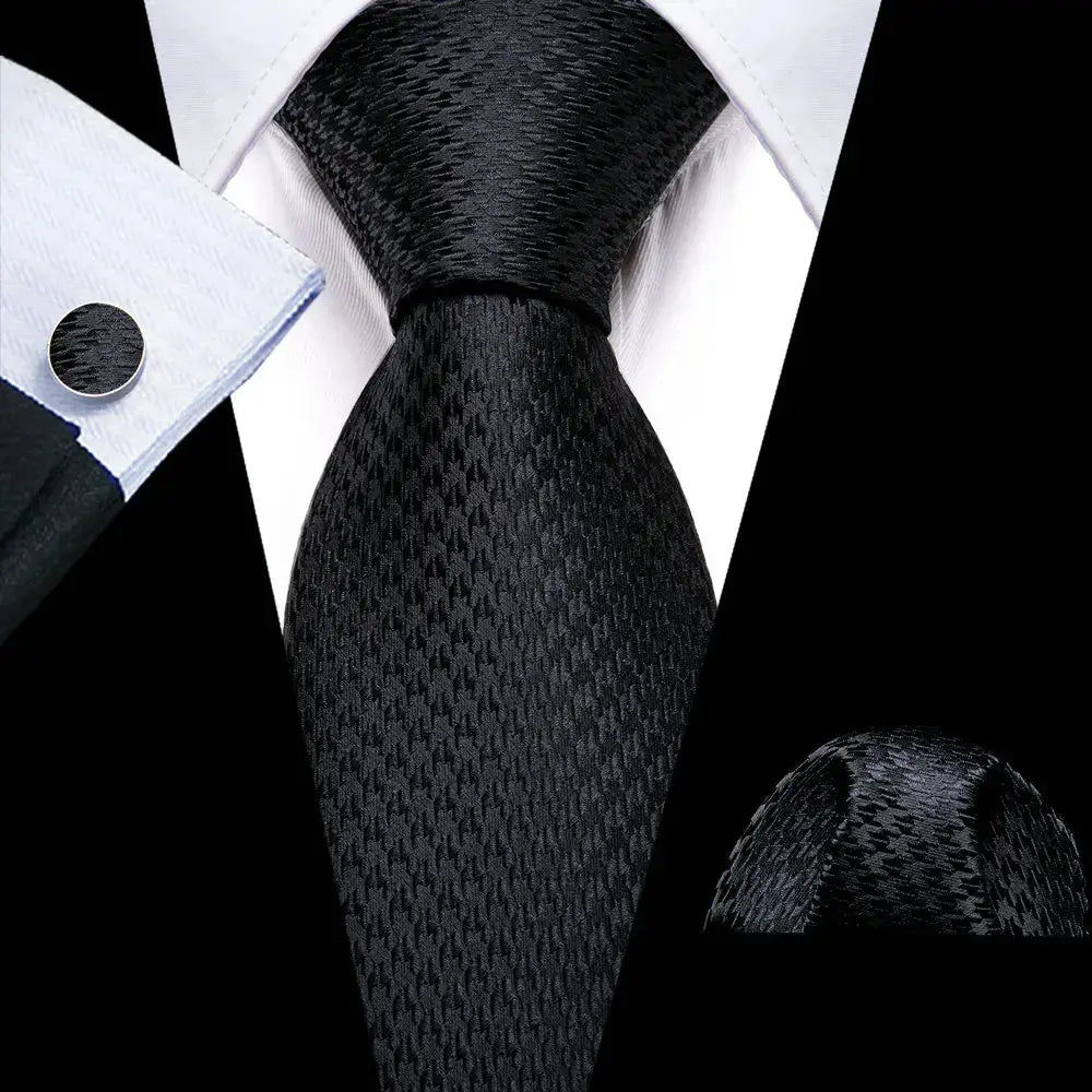 Versatile black silk tie with matching cufflinks for any event