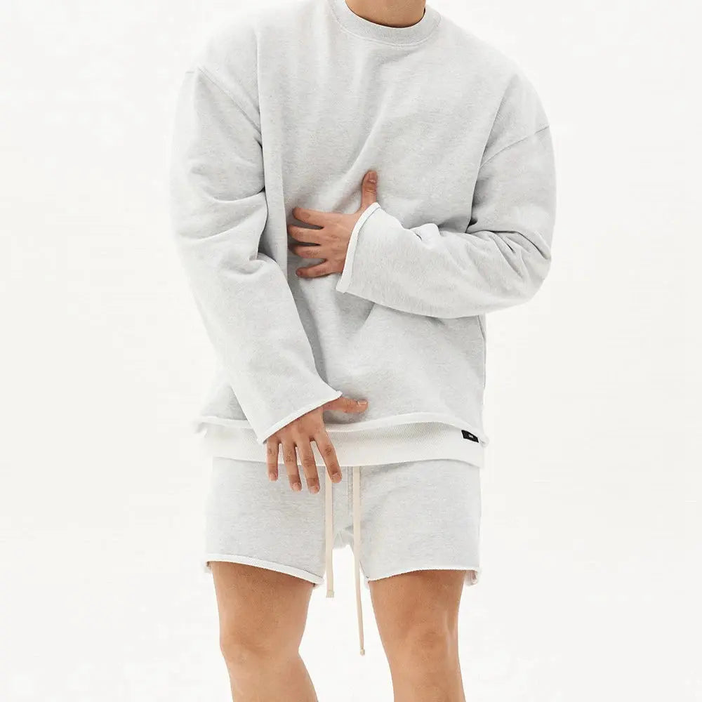 Men's sportswear hoodie with a cozy feel, great for chilly morning jogs.
