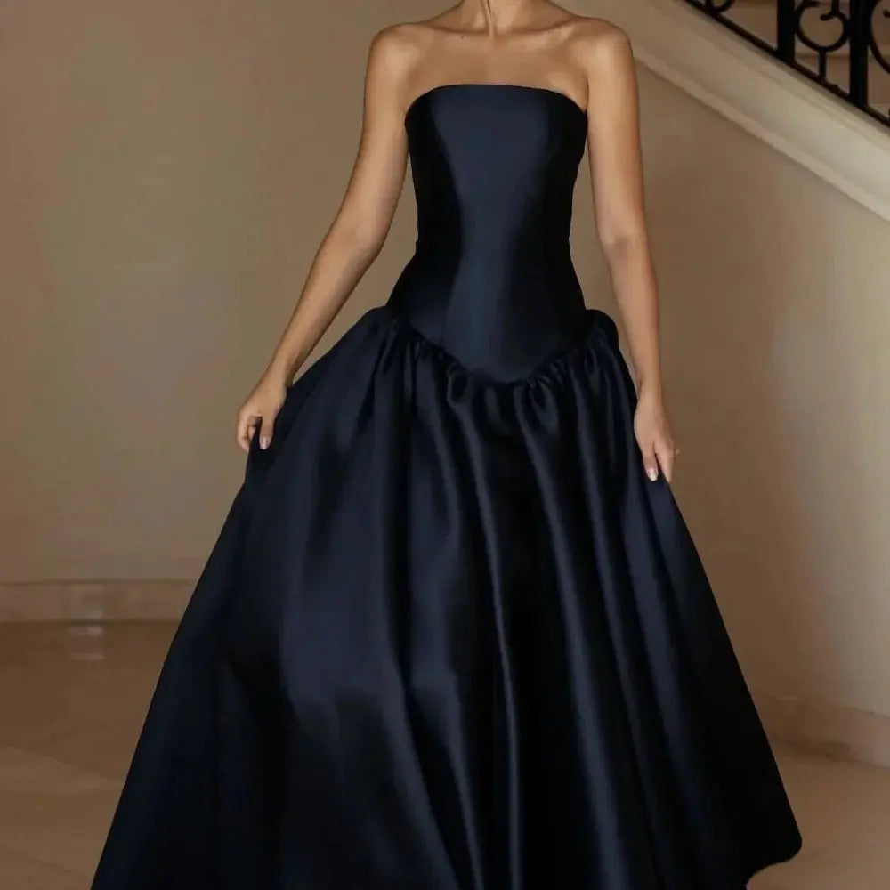 Detailed view of the tailored fit of the evening gown, emphasizing the flattering curves and craftsmanship.