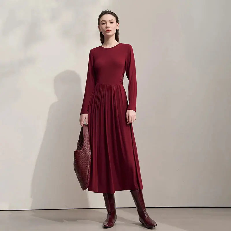 Model wearing the power dressing knit dress, exuding confidence in the office.