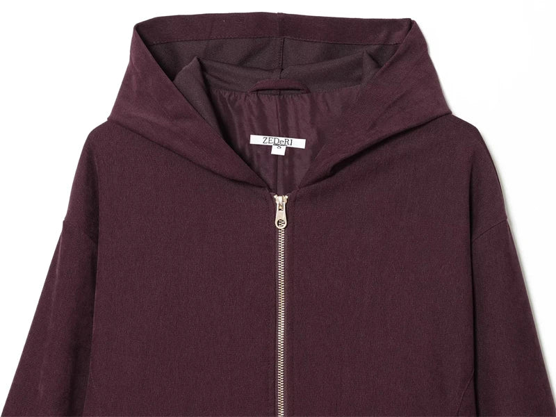 Flowing wide-leg pants with elastic waistband, offering comfort and elegance.