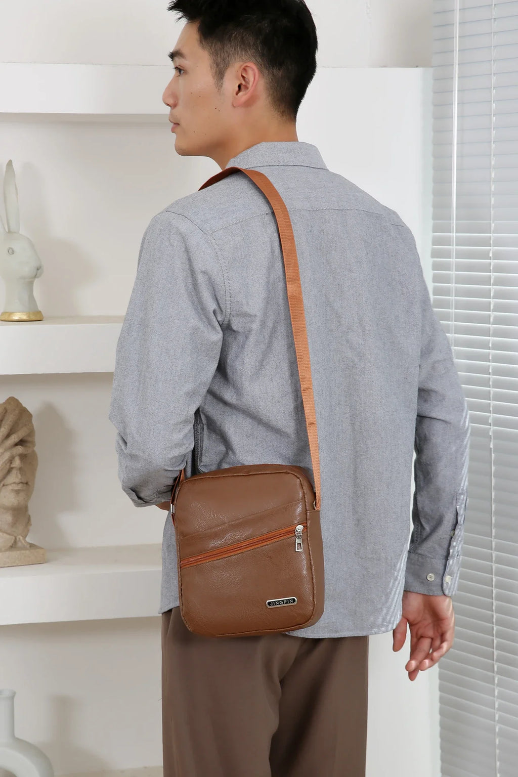 Weatherproof polyester bag with smart organization compartments for documents and tech devices