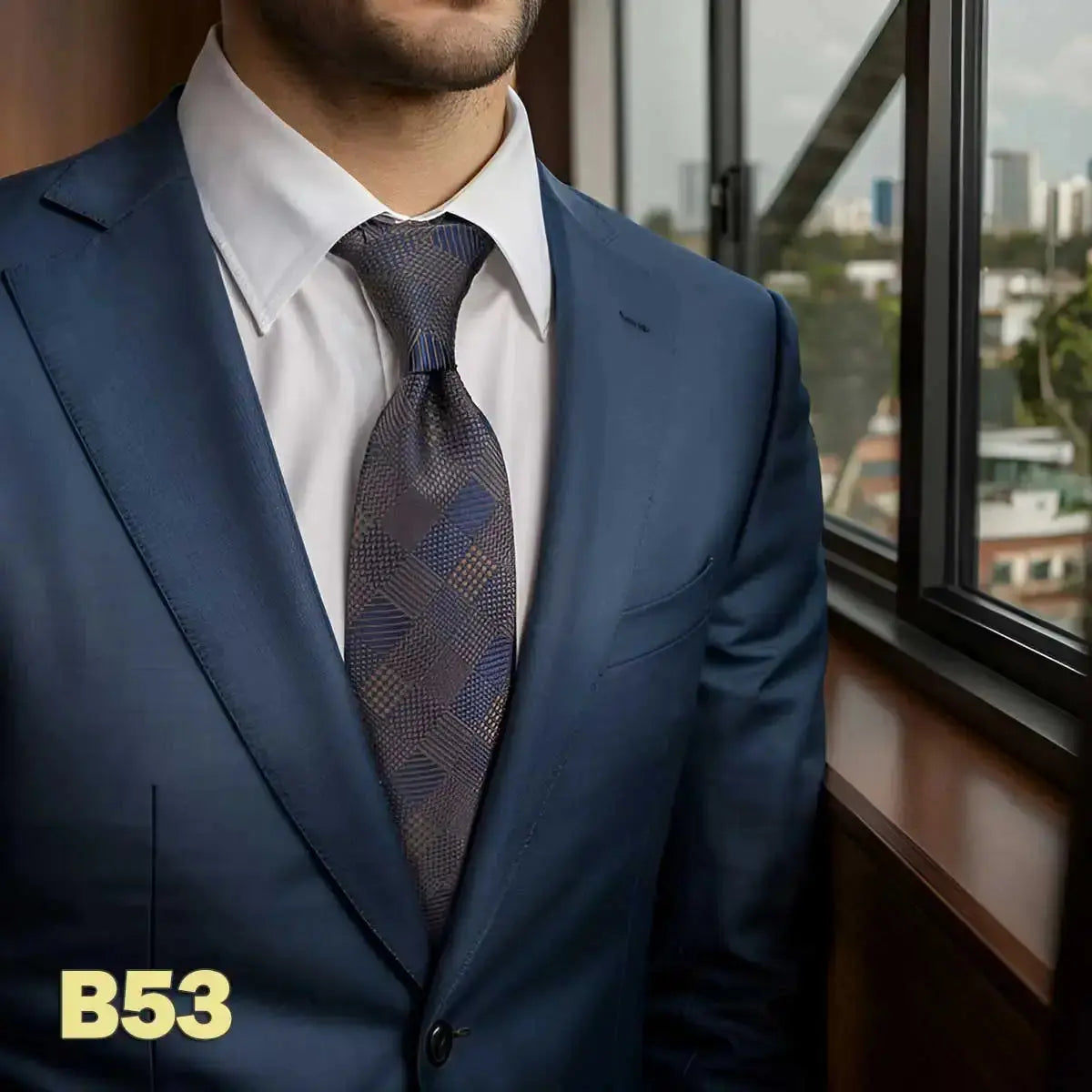 Elegant navy tie with intricate designs, perfect for business meetings.