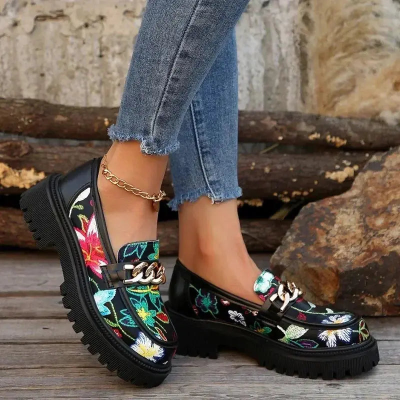 Side view of Chic Rendezvous Pumps featuring a comfortable square heel for stability.