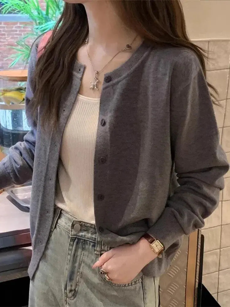 Model wearing Cozy Chic Cardigan, highlighting its slim-fit design and stylish simplicity.
