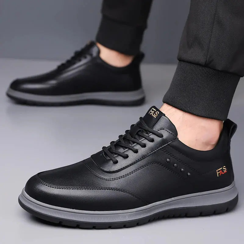 Professional split leather Oxford shoes showing polished finish and traditional brogue detailing