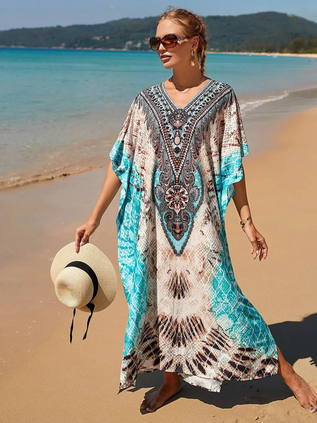 Breeze Whisper Kaftan in light fabric, featuring a V-neck and side slits for stylish summer wear.