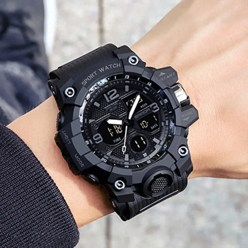 Stylish analog-digital watch with rubber band and resin case.