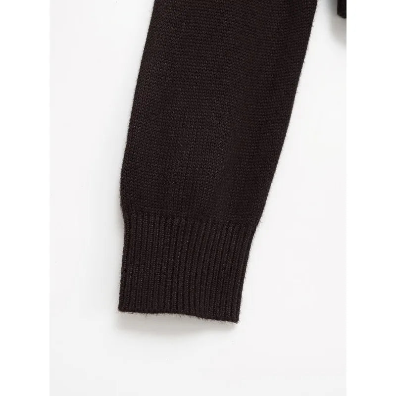 Back view of the Autumn Whispers cardigan, highlighting its elegant knitwear design and cozy fit.