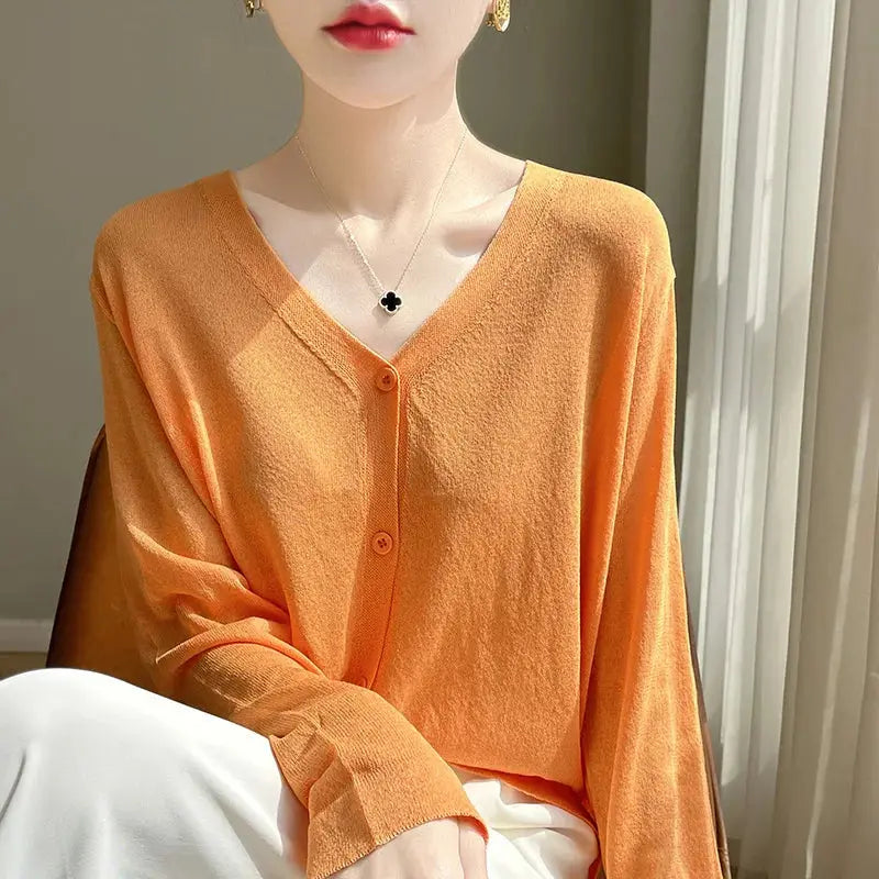 Lightweight ice silk Breeze Whisper Cardigan in soft pastel color, perfect for summer evenings.