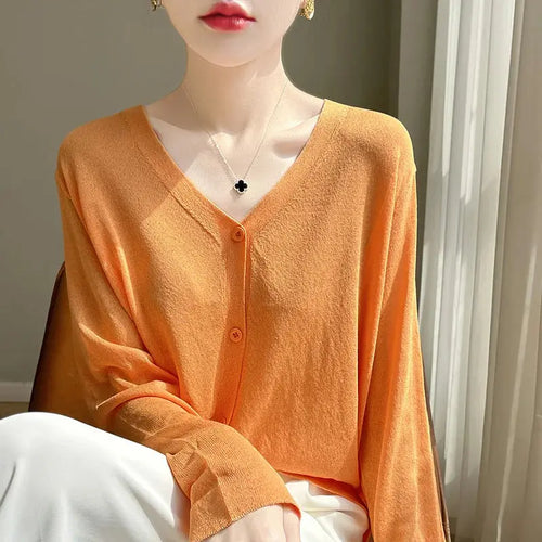 Lightweight ice silk Breeze Whisper Cardigan in soft pastel color, perfect for summer evenings.