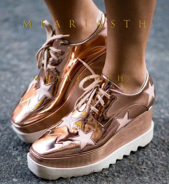 Detail shot of leather wedge sneaker platform and slip-on construction