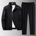 Stylish men's tracksuit in charcoal gray, designed for warmth and freedom of movement.