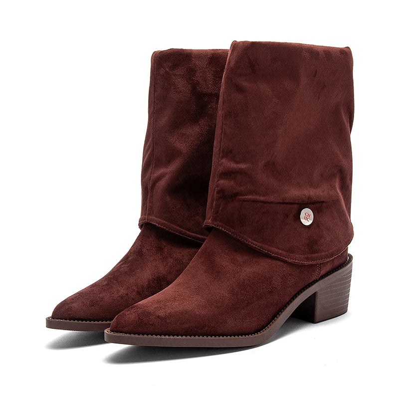 Comfortable waterproof boots featuring mid-calf height and effortlessly versatile design