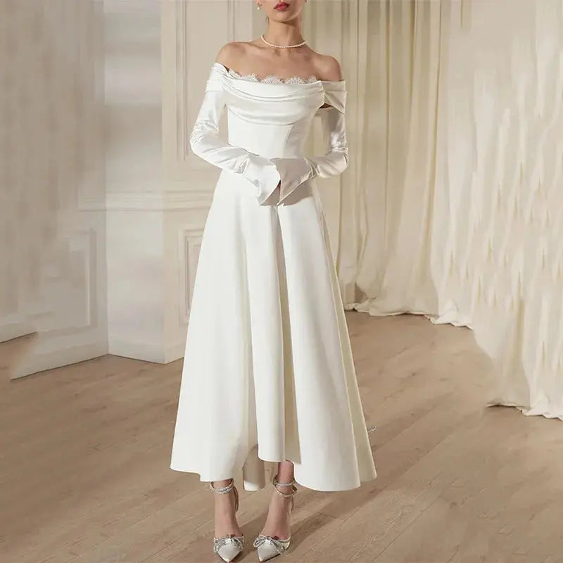 Back view of the bespoke bridal gown showcasing the elegant lace and tulle combination.