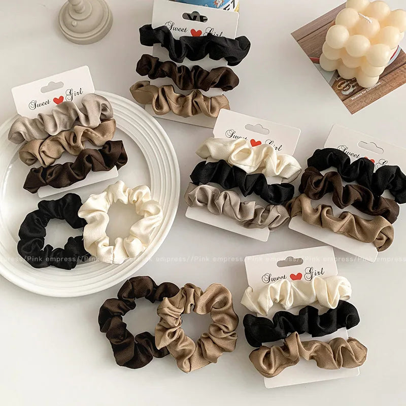 Elegant satin hair scrunchies reducing friction and protecting strands from breakage