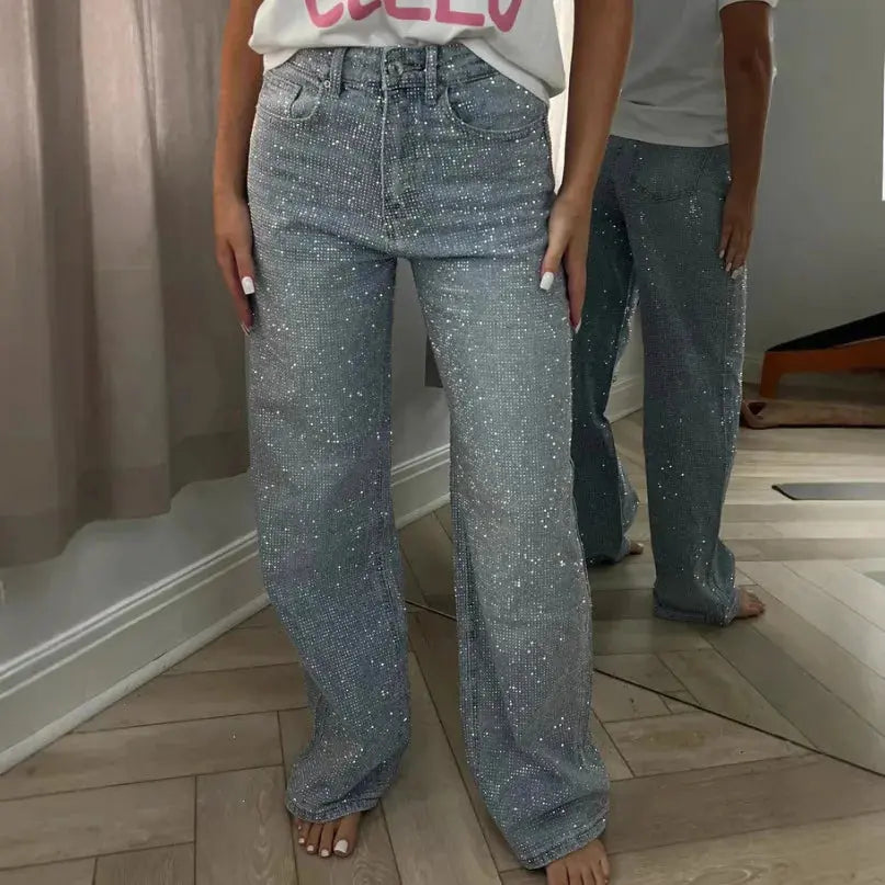 High-waist radiance jeans in dark blue denim with subtle shimmer finish.