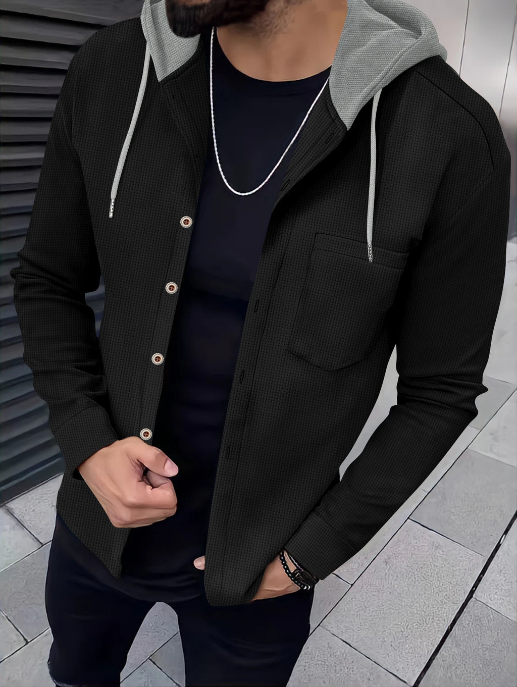 Button details on the Autumn Whisper cardigan, adding a classic touch.