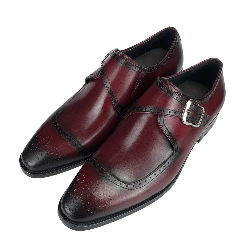 Close-up of horse-bit buckle detail on classic brown suede monk strap dress shoes