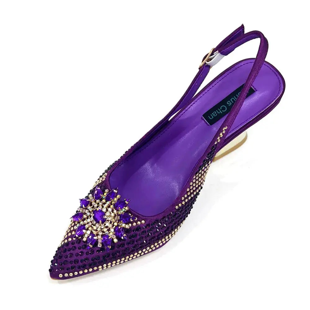 Close-up of Royal Twilight heels showcasing intricate rhinestone detailing.