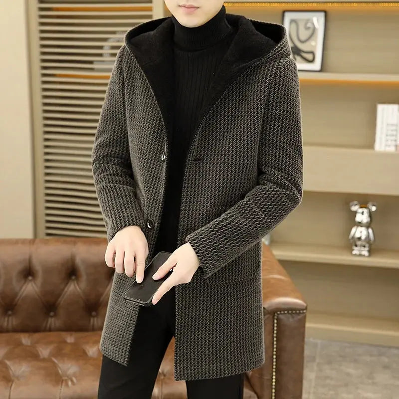 Luxe mink wool overcoat in deep navy with a built-in hood for warmth and style.