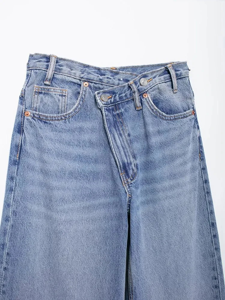 Side view of stylish women's asymmetric wide-leg jeans in breathable fabric.