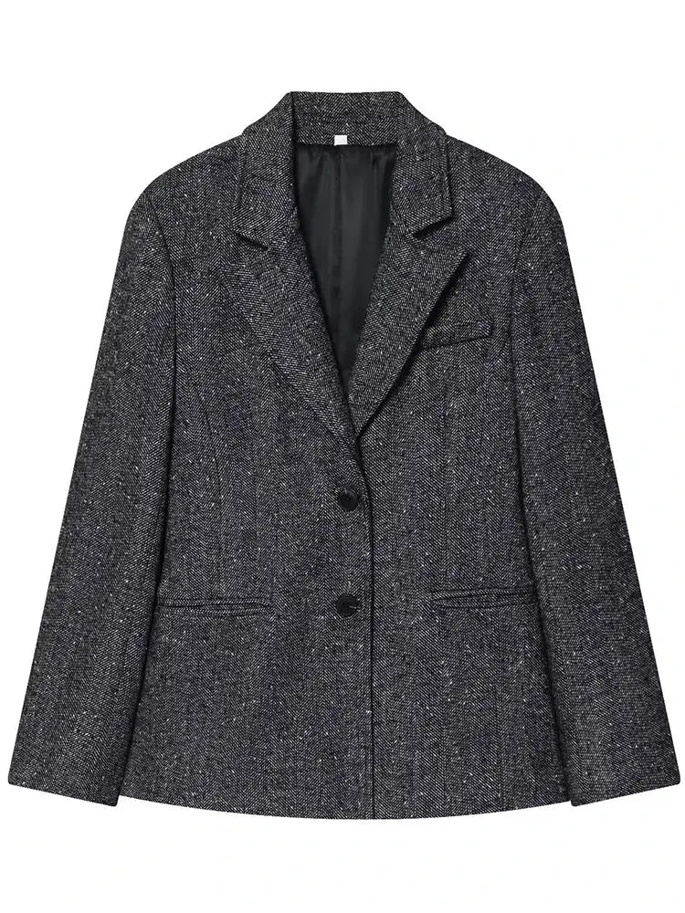 Flat lay of the suit set, showcasing its elegant and professional appeal.