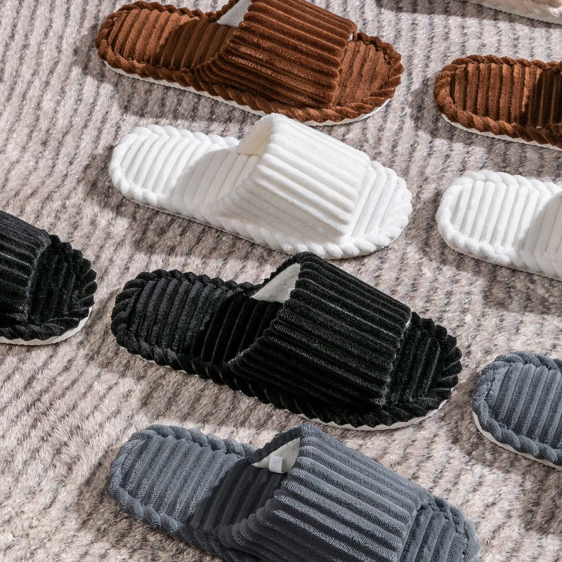 Minimalist corduroy slippers in gray, ideal for casual wear at home.