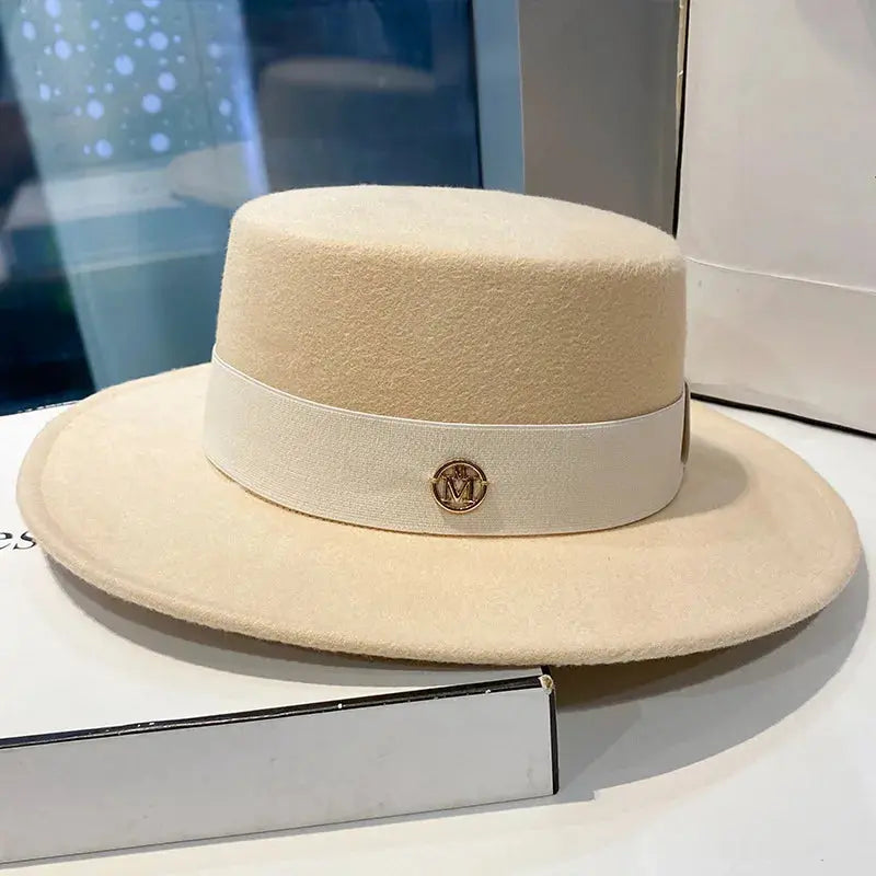Fashion statement hat with a refined ribbon band, suitable for elegant occasions.