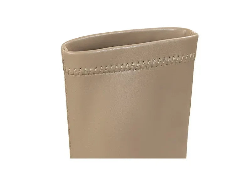 Versatile mid-calf boots combining comfort and sophisticated style