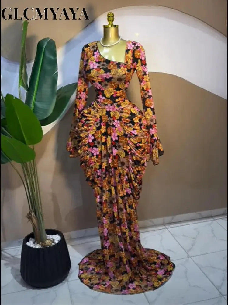 Model twirling in the Floral Whisper Asymmetrical Dress, showcasing its flowing movement.