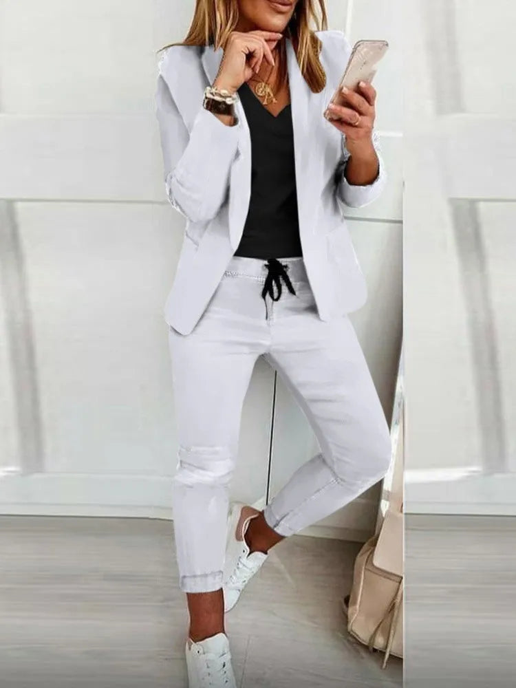 Model wearing the Chic Office Set, exuding confidence in a stylish professional environment.