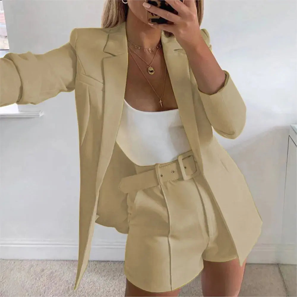 Full view of navy chic blazer and shorts set, embodying confidence and poise.