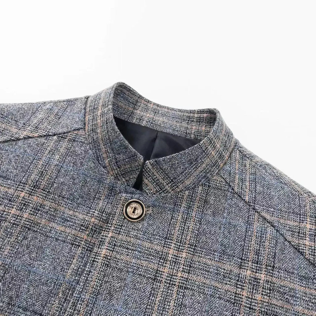 Detail of the vertical stripes on the blazer, emphasizing its distinctive style and British tailoring.