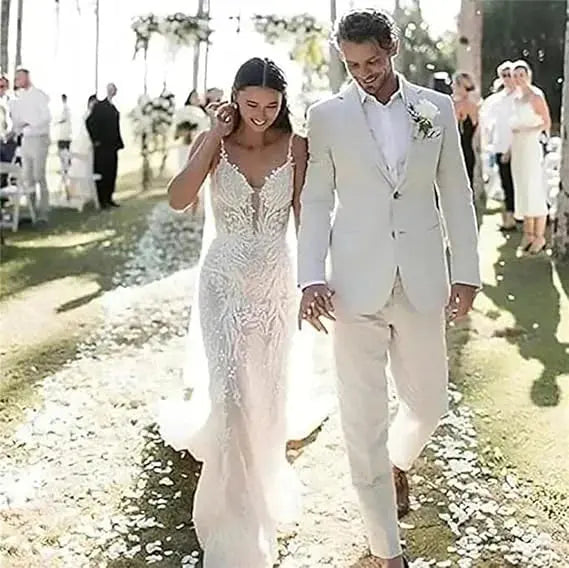 Lightweight linen suit in soft tones, perfect for outdoor summer events.