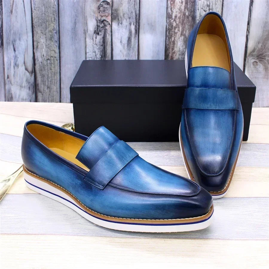 Waterproof men's leather loafers with solid pattern design perfect for office and formal occasions
