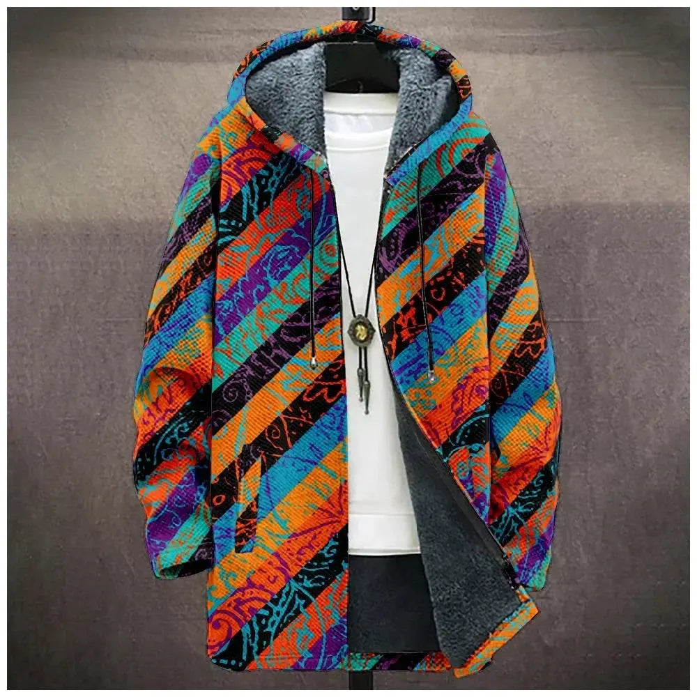 Winter Tribal Cardigan draped over a chair, showcasing its stylish design and colors.