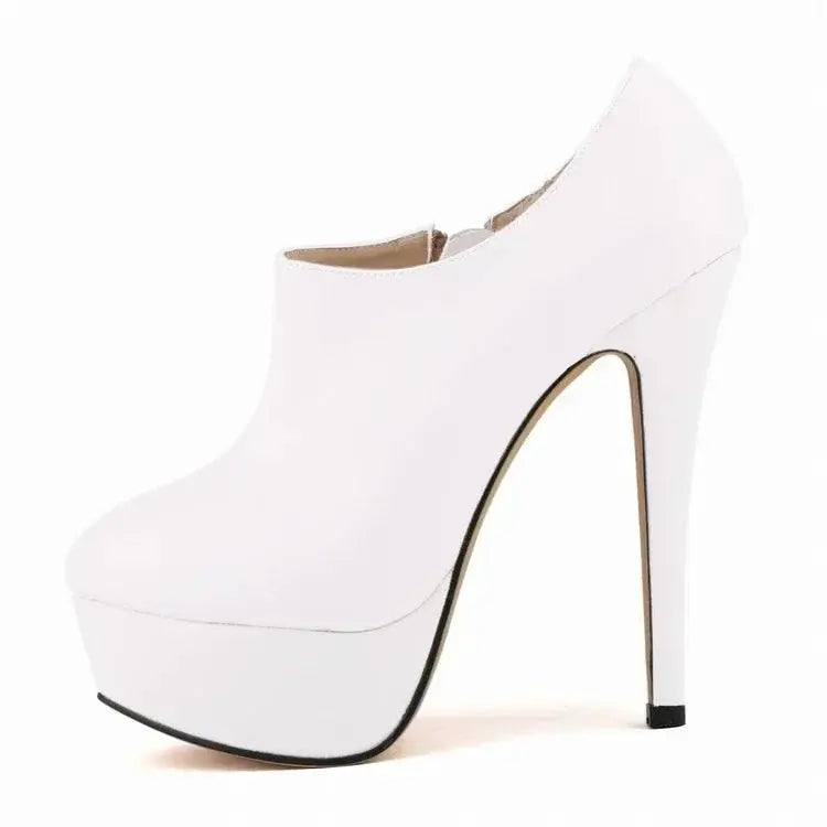Pair of high heel pumps with a striking design and quality materials.