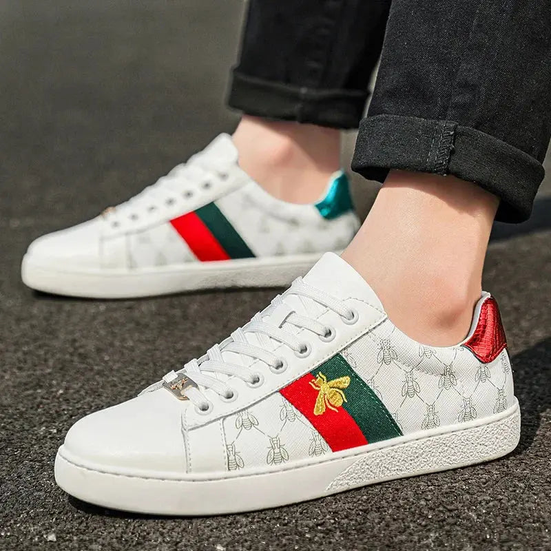 Designer leather skate sneakers with gold bee motif and modern microfiber accents for urban style