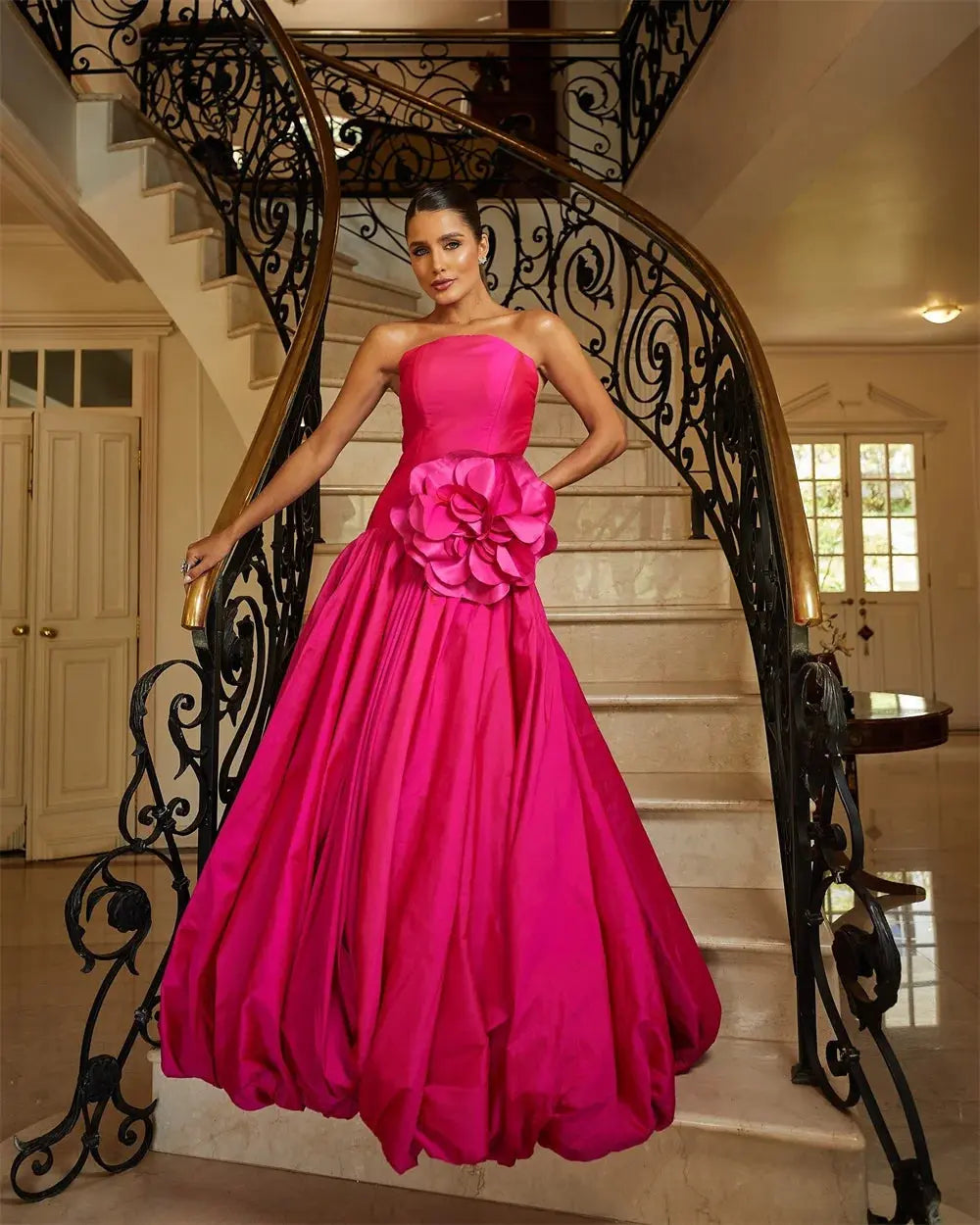 Back view of the tailored Enchanting Bloom Mermaid Gown highlighting its sculptural pleats.