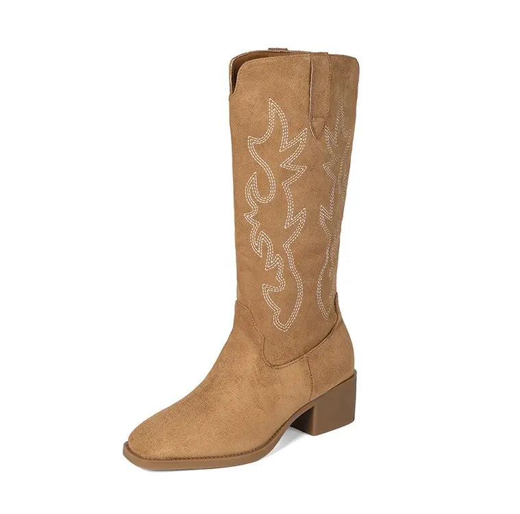 Embroidered cowboy boots on model showing true-to-size fit
